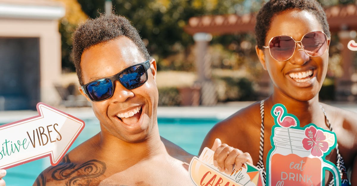 Man and Woman Smiling in the Swimming Pool